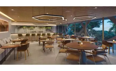 Uma área de estar em Beach Class Fortaleza By Studio Brook