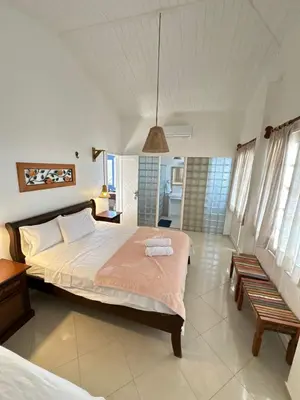 Uma cama ou camas num quarto em Pousada Caponga Praia Mar