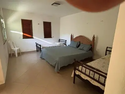 Uma cama ou camas num quarto em Acorde com o canto dos passaros