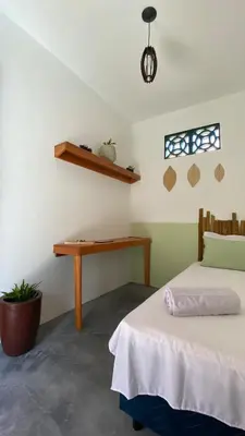 Uma cama ou camas num quarto em Casa Uai - Coziness on the coast of Ceará