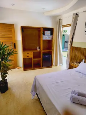 Uma cama ou camas num quarto em Casa Uai - Coziness on the coast of Ceará