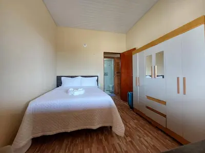 Uma cama ou camas num quarto em Haus Maresia