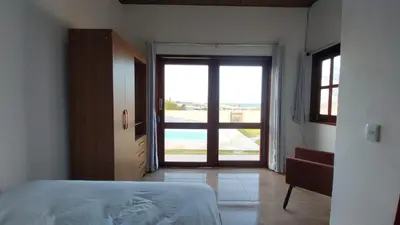 Uma cama ou camas num quarto em Haus Regenbogen