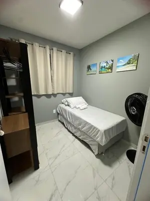 Uma cama ou camas num quarto em Ap Praia do Futuro - Fortaleza, pé na areia