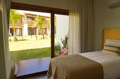 Uma cama ou camas num quarto em Villa Conduru III Kite House Preá 100m from Beach