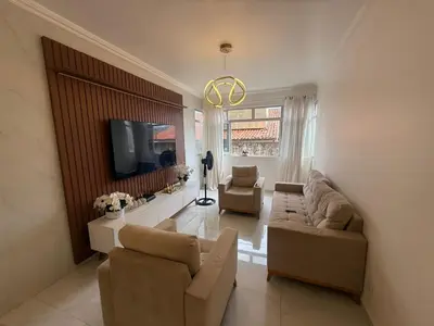 Uma televisão e/ou sistema de entretenimento em Apartamento temporada