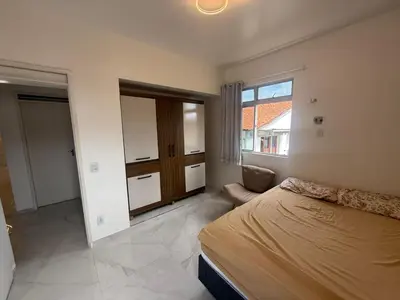 Uma cama ou camas num quarto em Apartamento temporada