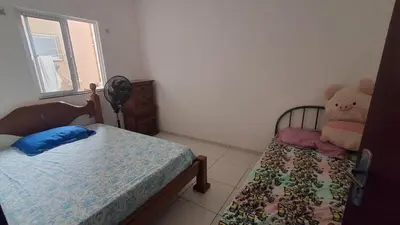 Uma cama ou camas num quarto em Casa em Paracuru a 5 min da praia