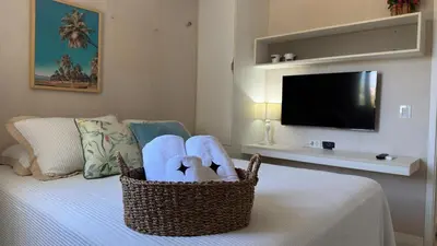Uma televisão e/ou sistema de entretenimento em 6 hóspedes - GolfVille Resort - 6min do beach park