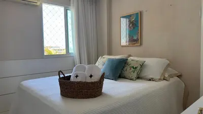 Uma cama ou camas num quarto em 6 hóspedes - GolfVille Resort - 6min do beach park