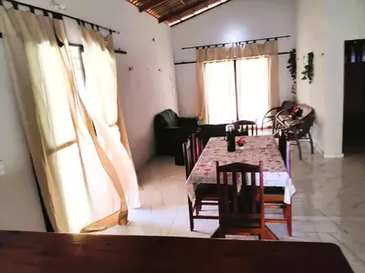 Uma área de estar em Casa Do Canto Verde