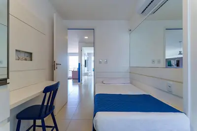 Uma cama ou camas num quarto em Apartamento Golf Ville - Beach Park