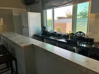 A cozinha ou kitchenette de Green Paradise Residence Praia de Canoa Quebrada