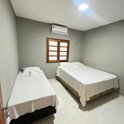 Uma cama ou camas num quarto em Casa com 3 dormitórios na Praia do Preá com Piscina
