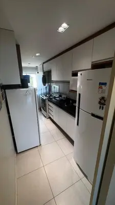 A cozinha ou kitchenette de Apto Golf Ville resort com 3 suites