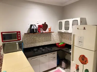 A cozinha ou kitchenette de Casa Loft Mob 2 suítes próx Arena Castelão
