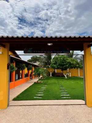 Um jardim no exterior de Casa Barra da Sucatinga-Beberibe