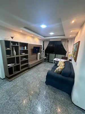 Uma área de estar em Apartamento Familiar