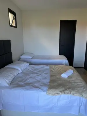 Uma cama ou camas num quarto em Apto no Aquaville resort perto do Beach Park