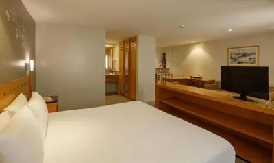 Uma cama ou camas num quarto em Hotel Fortaleza Beira Mar Blue Tree Towers