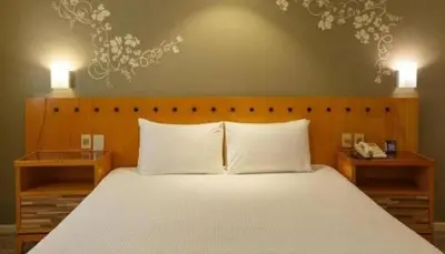 Uma cama ou camas num quarto em Hotel Fortaleza Beira Mar Blue Tree Towers