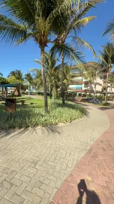 Um jardim no exterior de Mandara Lanai - Apto 101, bloco 12 - 2quartos, 3 wcs - Porto Dunas, pé na areia