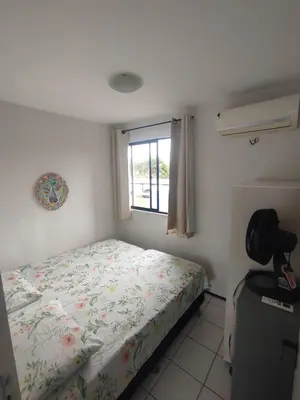 Uma cama ou camas num quarto em Cumbuco Geek House