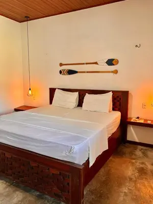 Uma cama ou camas num quarto em Grand VillaBlue pousada boutique Icaraizinho