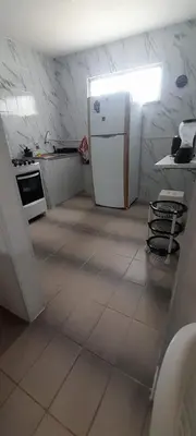 A cozinha ou kitchenette de APARTAMENTO COM PISCINA 500mt DA PRAIA e 10 MINUTOS DE CUMBUCO