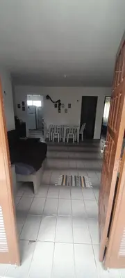 Uma área de estar em APARTAMENTO COM PISCINA 500mt DA PRAIA e 10 MINUTOS DE CUMBUCO