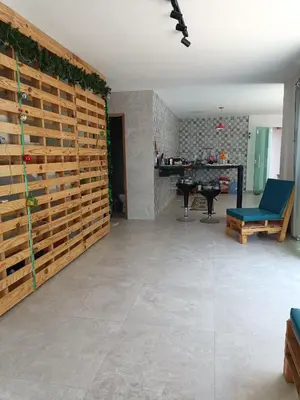 Uma área de estar em Casa com 2 quartos