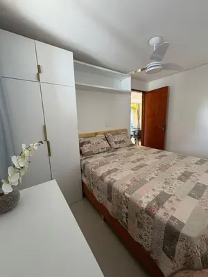 Uma cama ou camas num quarto em Oásis Cumbuco Residence