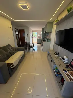 Uma televisão e/ou sistema de entretenimento em Oásis Cumbuco Residence