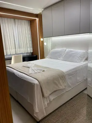 Uma cama ou camas num quarto em Hotel Beach Class Meireles