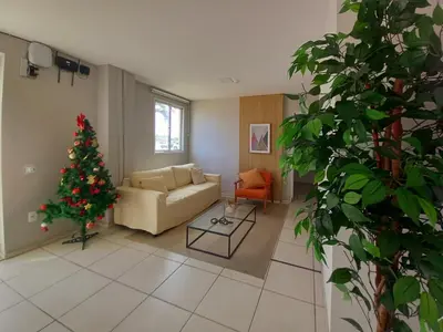 Uma área de estar em Estilo Dunas Residence Lazer & Vista Mar