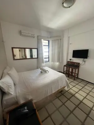 Uma cama ou camas num quarto em Golden Fortaleza Hotel 1 quarto