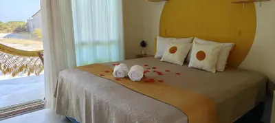 Uma cama ou camas num quarto em Chalé Com Piscina Privativa