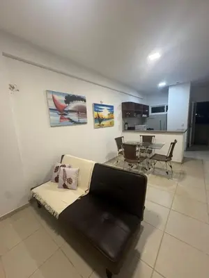 Uma área de estar em Luau da Taiba apartment