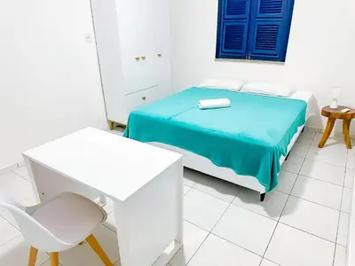 Uma cama ou camas num quarto em Casa da Vó Rita - com Café da Manhã - Praia do Cumbuco