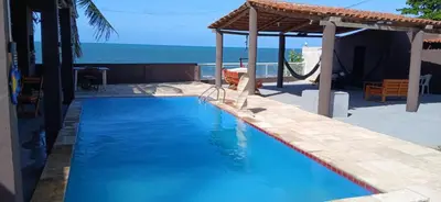 A piscina em ou perto de Casa de praia de frente para o mar