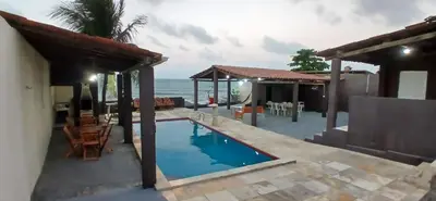A piscina em ou perto de Casa de praia de frente para o mar