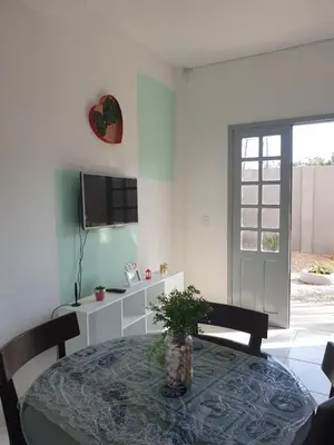 Uma televisão e/ou sistema de entretenimento em Loft Praia do Futuro Croco Beach