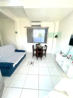 Uma área de estar em Loft Praia do Futuro Croco Beach