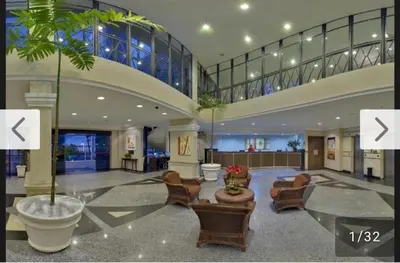 Uma área de estar em Beira Mar Breeze Apartment