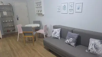 Uma área de estar em Flat Meireles - Fortaleza