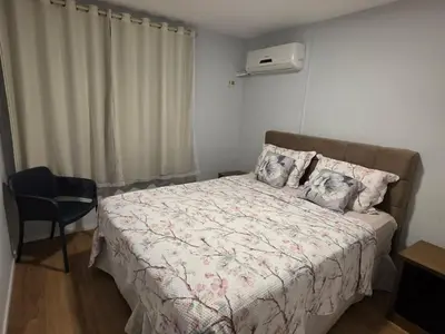 Uma cama ou camas num quarto em Flat Meireles - Fortaleza