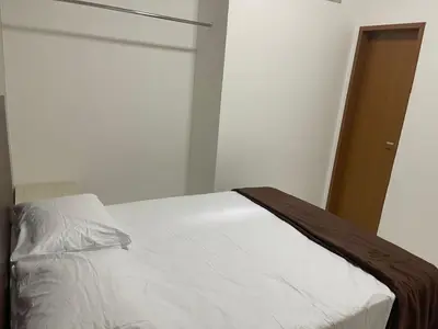 Uma cama ou camas num quarto em Hotel complexo paris