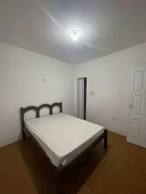 Uma cama ou camas num quarto em Casa de Praia