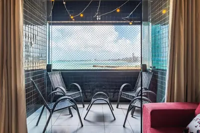 Uma área de estar em Aquidabã #803 - Apartamento vista mar by Carpediem