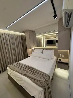 Uma cama ou camas num quarto em Apartamento studio novo completo - Beach Class Meireles
